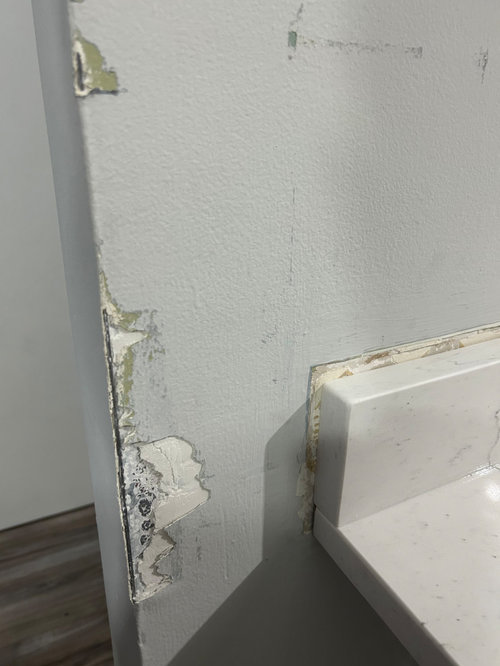 Drywall damaged during kitchen countertop installation. Help!