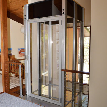 Boxborough Deck House with Modern Home Elevator