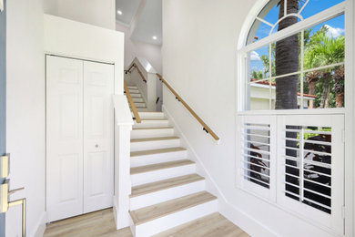 Example of a trendy home design design in Miami
