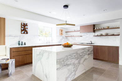 This is an example of a large contemporary l-shaped eat-in kitchen in Los Angeles with an undermount sink, flat-panel cabinets, brown cabinets, marble benchtops, white splashback, marble splashback, panelled appliances, ceramic floors, with island and grey floor.