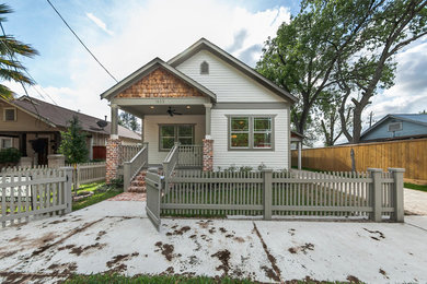 Mid-sized arts and crafts white one-story concrete fiberboard exterior home photo in Houston