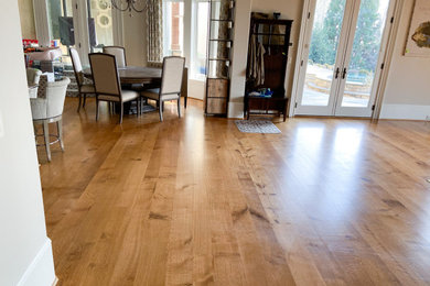 Kitchen/dining room combo - rustic medium tone wood floor kitchen/dining room combo idea in Other