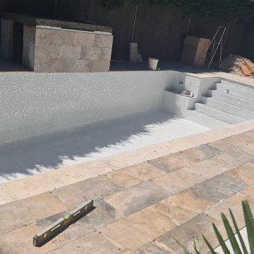 Piscina de obra y solado exterior