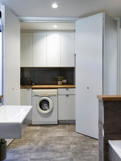 Transitional Laundry Room by RMR Architects