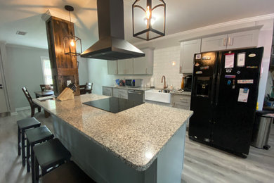 Example of a cottage kitchen design in Other