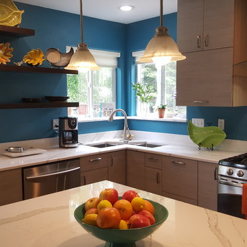 This is a two tone updated kitchen with efficient use of space & feature points