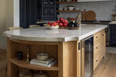 Example of a transitional kitchen design in Sacramento
