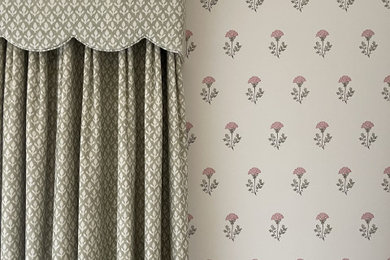 Photo of a medium sized country bedroom in Other with pink walls, carpet, beige floors and panelled walls.