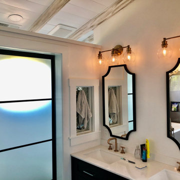 Vanity with Frosted Black Grid Watercloset Door