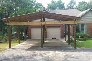 Mid-sized detached two-car carport photo in Other