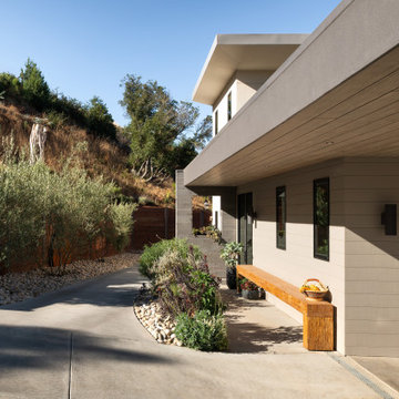 A little farm below a hillside resort-style off-the-grid view home