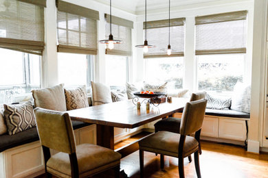 Example of a transitional dining room design in Other