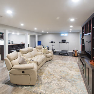 Inspiration for a medium sized traditional open plan home cinema in Louisville with grey walls, porcelain flooring, a built-in media unit and beige floors.