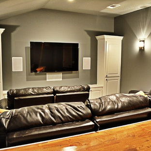 Inspiration for a rustic home theater remodel in Jackson