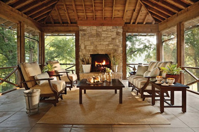 Example of an island style home design design in Birmingham