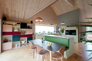 Immagine di una cucina abitabile moderna di medie dimensioni