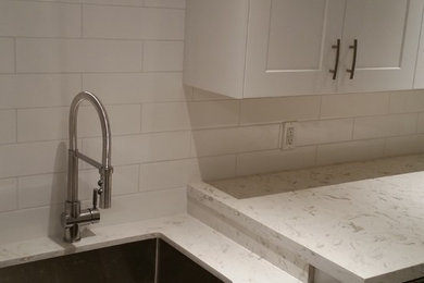 Inspiration for a contemporary laundry room remodel in Toronto