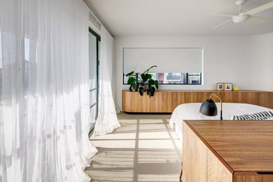 Photo of a contemporary bedroom in Sydney.