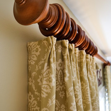 Kitchen with panels and shade with fabric and matching tassel trim.