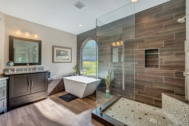 Example of a large transitional master multicolored tile and mosaic tile porcelain tile and beige floor bathroom design in Dallas with shaker cabinets, gray cabinets, beige walls, an undermount sink and granite countertops