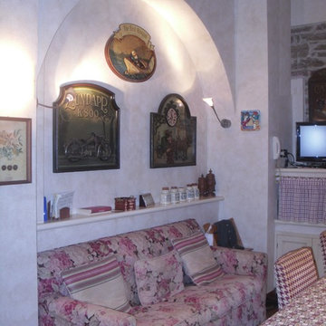 locale cucina-pranzo con travetti in legno a soffitto