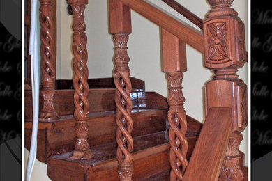 Inspiration for a victorian wooden u-shaped staircase remodel with wooden risers