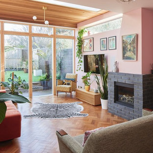 Design ideas for a midcentury living room in Surrey.