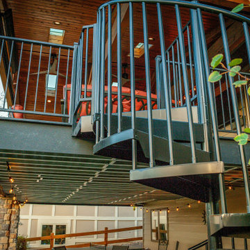 Composite deck with finished living space under the deck