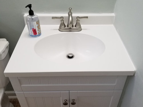 Help Gap Between Countertop And Wall, How To Fill Gap Between Bathroom Cabinet And Wall