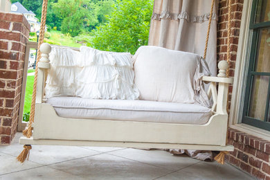 This is an example of a farmhouse porch design in Nashville.