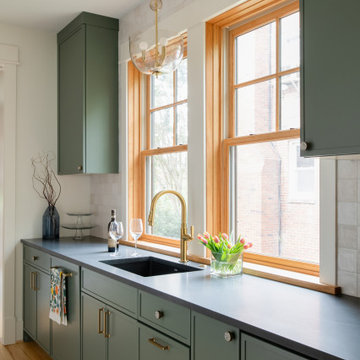 Warm Modern Kitchen Renovation with Natural Oak & Green Accents