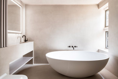 ロンドンにある高級な中くらいなコンテンポラリースタイルのおしゃれな浴室の写真