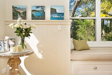 This is an example of a beach style sunroom in Sydney.