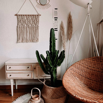 Eclectic Loft Living Room with Wood Floors and Base Moulding