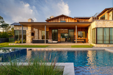Example of a cottage patio design in Dallas