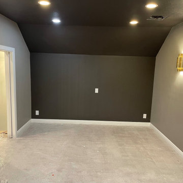 Attic conversion into media room and kitchenette