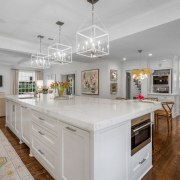 Elegant Modern French Country Kitchen with Marble Accents and Floral Charm