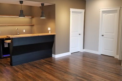 Example of a minimalist basement design in Edmonton