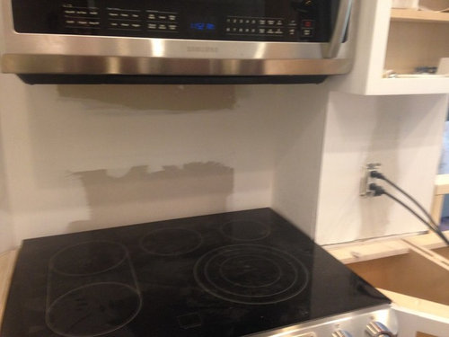 quartz behind stove