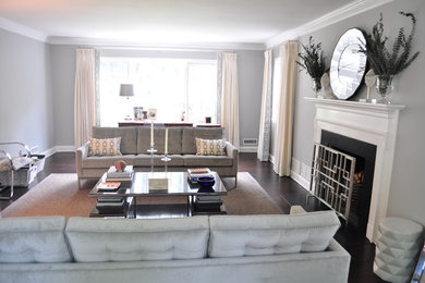 This is an example of a mid-sized transitional enclosed living room in New York.