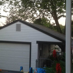 Storm Restoration St. Ann - Roofing And Gutters