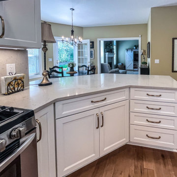 White Kitchen with Black Range Hood and Taj Royale quartz Countertops