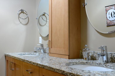 Small trendy kids' bathroom photo in Other with an undermount sink, shaker cabinets, light wood cabinets, granite countertops and beige walls