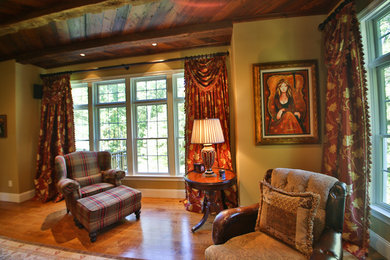 Living room - mid-sized traditional formal and enclosed medium tone wood floor and brown floor living room idea in Boston with beige walls, a two-sided fireplace, a brick fireplace and no tv
