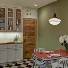 combination of wall color and cabinets