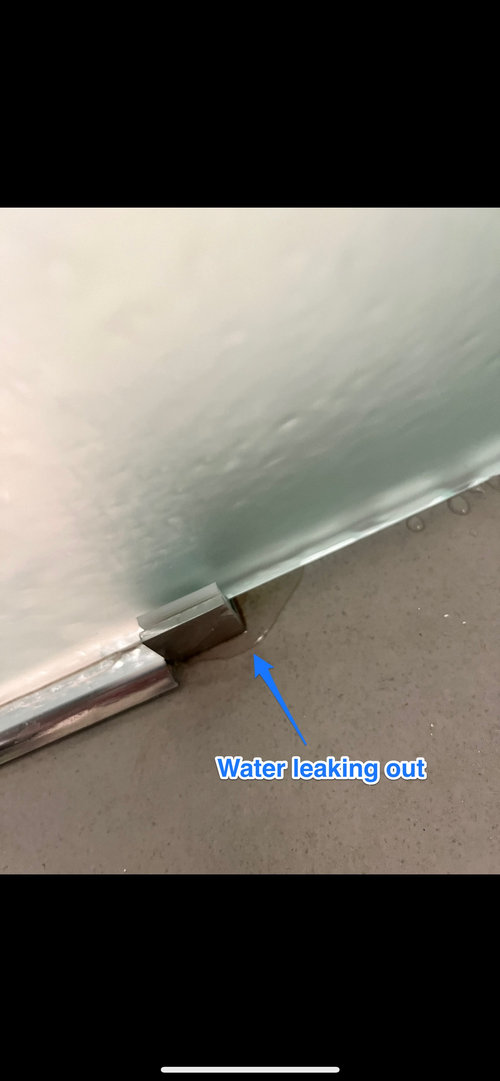 Water coming under shower sliding barn door