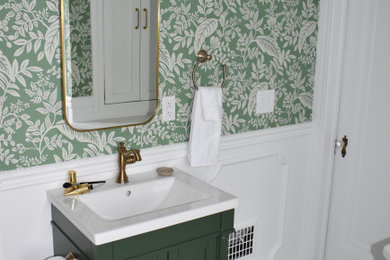 Bathroom - mid-sized transitional white tile and ceramic tile single-sink bathroom idea in Detroit with furniture-like cabinets, green cabinets, white countertops and a freestanding vanity
