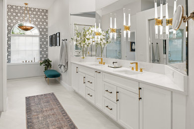 Inspiration for a large modern master black and white tile and marble tile porcelain tile, white floor and double-sink bathroom remodel in Tampa with shaker cabinets, white cabinets, a two-piece toilet, white walls, an undermount sink, quartz countertops, a hinged shower door, white countertops and a built-in vanity