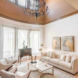 Inspiration for a timeless formal beige floor living room remodel in Tampa with white walls
