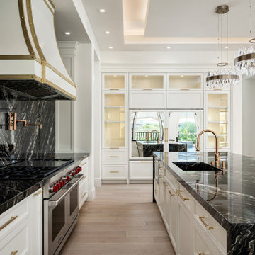 Statement Range Hood and Stone Backsplash